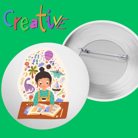 On a Green background, the front and back of a pin-back button are displayed, with a drawing of a young girl working on a project/book with a crowd of ideas around her head. The word "Creative" appears in a decorative, multicolored font above the button.