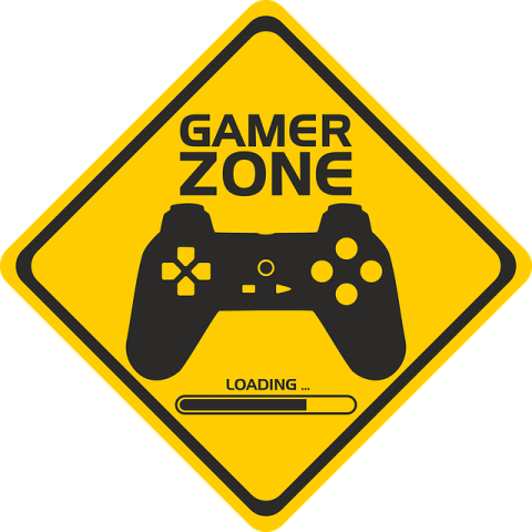 Yellow road sign with Gamer Zone and a controller on it in black.