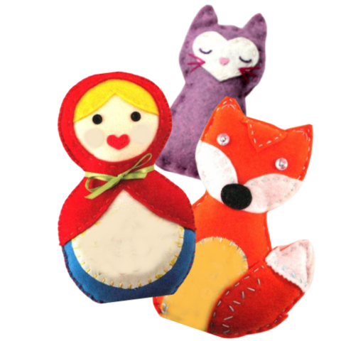 3 stuffed felt creations: a marushka style doll, a purple kitty, and an orange fox