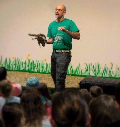 Wildlife educator from Rizzo's shows off a turtle