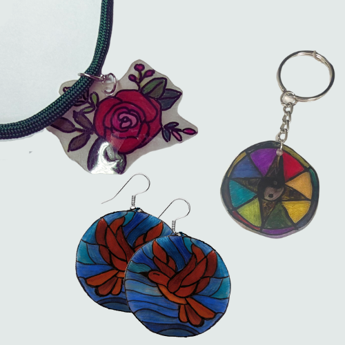a necklace, earrings, and a keychain made out of Shrink Plastic (Shrinky-Dinks)